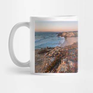 Sunset in beach with rocks in Porto Covo in Alentejo, Portugal Mug